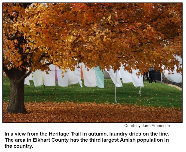 In a view from the Heritage Trail in autumn, laundry dries on the line. The area in Elkhart County has the third largest Amish population in the country. Courtesy Jane Ammeson.