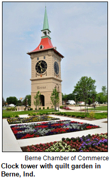 Clock tower with quilt garden in Berne, Ind. Courtesy Berne Chamber of Commerce.