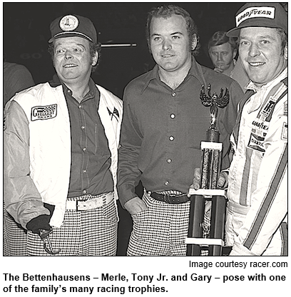 The Bettenhausens, Merle, Tony Jr. and Gary, pose with one of the family’s many racing trophies. Image courtesy racer.com.