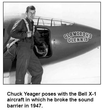Chuck Yeager poses with the Bell X-1 aircraft in which he broke the sound barrier in 1947. 