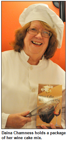 Daina Chamness holds a package of her wine cake mix.  