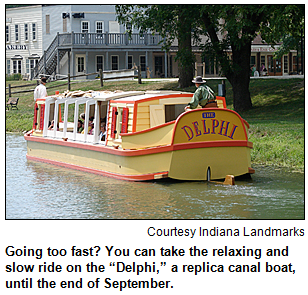 Going too fast? You can take the relaxing and slow ride on the “Delphi,” a replica canal boat, until the end of September. Image courtesy Indiana Landmarks.