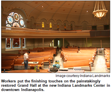 Workers put the finishing touches on the painstakingly restored Grand Hall at the new Indiana Landmarks Center in downtown Indianapolis. Image courtesy Indiana Landmarks.