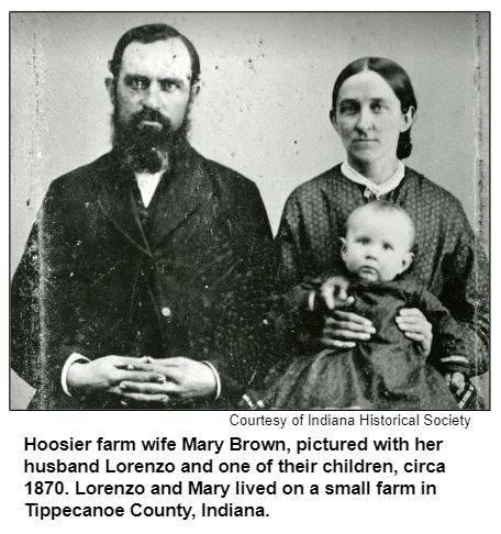 Hoosier farm wife Mary Brown, pictured with her husband Lorenzo and one of their children, circa 1870. Lorenzo and Mary lived on a small farm in Tippecanoe County, Indiana.