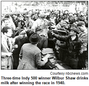 Three-time Indy 500 winner Wilbur Shaw drinks milk after winning the race in 1940. Image courtesy nbcnews.com.