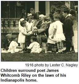 Children surround poet James Whitcomb Riley on the lawn of his Indianapolis home.