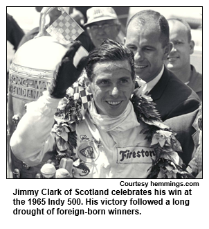 Jimmy Clark of Scotland celebrates his win at the 1965 Indy 500. His victory followed a long drought of foreign-born winners. 
 Courtesy hemmings.com