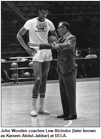 John Wooden coaches Lew Alcindor at UCLA.