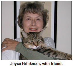 Joyce Brinkman with Bobb, her cat.