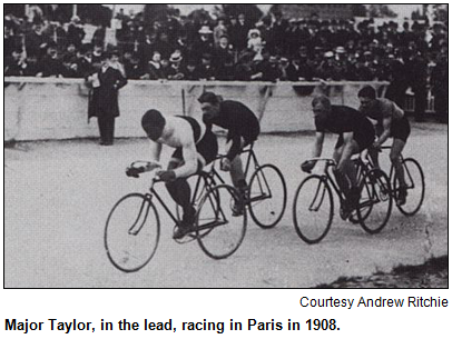 Major Taylor, in the lead, racing in Paris in 1908. Image courtesy Andrew Ritchie.