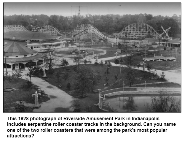 1928 photograph of Riverside Amusement Park in Indianapolis includes roller coaster tracks in the background. Can you name one of the two roller coasters in the park?