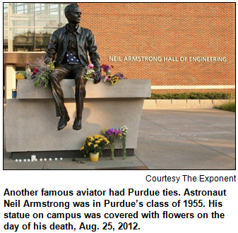 Another famous aviator had Purdue ties. Astronaut Neil Armstrong was in Purdue’s class of 1955. His statue on campus was covered with flowers on the day of his death, Aug. 25, 2012. Image courtesy The Exponent.