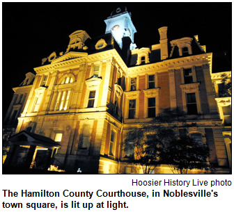 The Hamilton County Courthouse, in Noblesville's town square, is lit up at light. Hoosier History Live photo.
