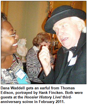 Dana Waddell gets an earful from Thomas Edison, portrayed by Hank Fincken. Both were guests at the Hoosier History Live! third-anniversary soiree in February 2011.