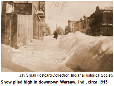 Snow piled high in downtown Warsaw, Ind., circa 1915. Courtesy Indiana Historical Society.