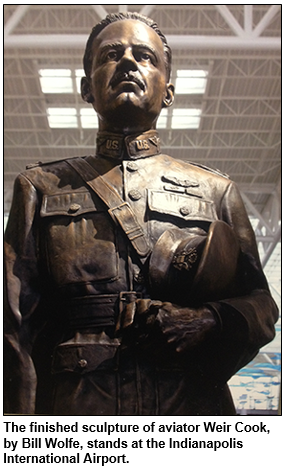 The finished sculpture of aviator Weir Cook, by Bill Wolfe, stands at the Indianapolis International Airport.
