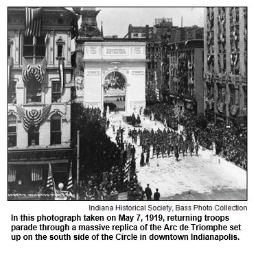 In this photograph taken on May 7, 1919, returning troops parade through a massive replica of the Arc de Triomphe set up on the south side of the Circle in downtown Indianapolis.
Courtesy Indiana Historical Society, Bass Photo Collection.