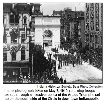 In this photograph taken on May 7, 1919, returning troops parade through a massive replica of the Arc de Triomphe set up on the south side of the Circle in downtown Indianapolis.
Courtesy Indiana Historical Society, Bass Photo Collection.