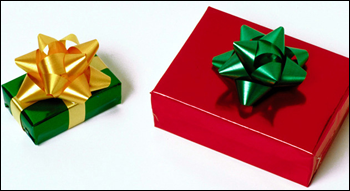 Holiday gift boxes, wrapped with ribbons.