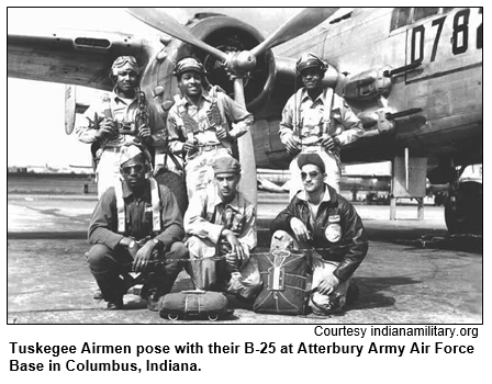 Tuskegee Airmen pose with their B-25 at Atterbury Army Air Force Base in Columbus, Indiana.