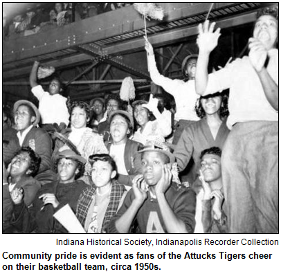 Community pride is evident as fans of the Attucks Tigers cheer on their basketball team, circa 1950s. Image courtesy Indiana Historical Society, Indianapolis Recorder Collection.