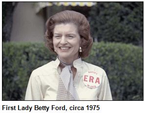 First Lady Betty Ford is pictured with a large ERA button, circa 1975.