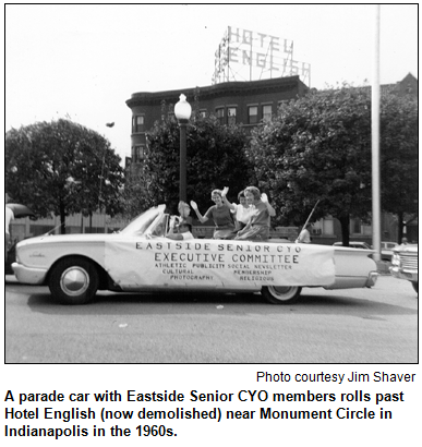 A parade car with Eastside Senior CYO members rolls past Hotel English (now demolished) near Monument Circle in Indianapolis in the 1960s. Photo courtesy Jim Shaver.