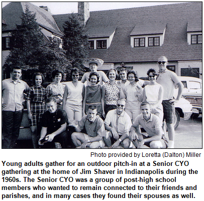 Young adults gather for an outdoor pitch-in at a Senior CYO gathering at the home of Jim Shaver in Indianapolis during the 1960s. Photo courtesy Loretta (Dalton) Miller.