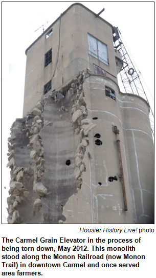 The Carmel Grain Elevator in the process of being torn down, May 2012. This monolith stood along the Monon Railroad (now Monon Trail) in downtown Carmel and once served area farmers. Hoosier History Live photo.