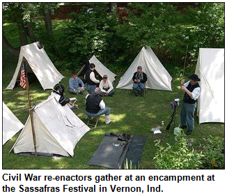 Civil War re-enactors gather at an encampment at the Sassafras Festival in Vernon, Ind.