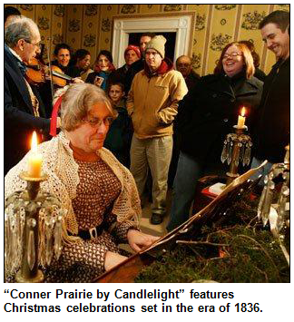 Image of period re-enactors playing piano and fiddle while onlookers in modern dress look on. Conner Prairie by Candlelight features Christmas celebrations set in the era of 1836.