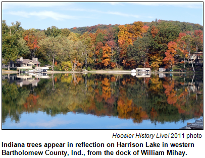 Indiana trees appear in reflection on Harrison Lake in western Bartholomew County, Ind., from the dock of William Mihay. Hoosier History Live! 2011 photo.