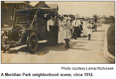 A Meridian Park neighborhood scene, circa 1912. People dressed formally and laughing in front of houses, on the street. Photo courtesy Lamar Richcreek.