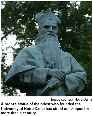 A bronze statue of the priest who founded the University of Notre Dame has stood on campus for more than a century.
 Image courtesy University of Notre Dame.