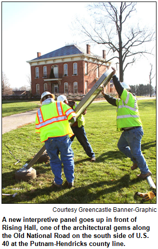 A new interpretive panel goes up in front of Rising Hall, one of the architectural gems along the Old National Road on the south side of U.S. 40 at the Putnam-Hendricks county line. Image courtesy Greencastle Banner-Graphic.