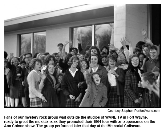 Fans of our mystery rock group wait outside the studios of WANE-TV in Fort Wayne, ready to greet the musicians as they promoted their 1964 tour with an appearance on the Ann Colone show. The group performed later that day at the Memorial Coliseum. Courtesy Courtesy Stephen Perfect/wane.com

