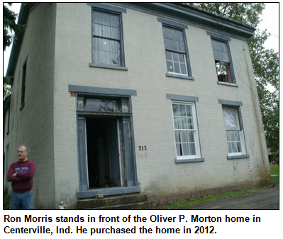 Ron Morris stands in front of the Oliver P. Morton home in Centerville, Ind. He purchased the home in 2012.