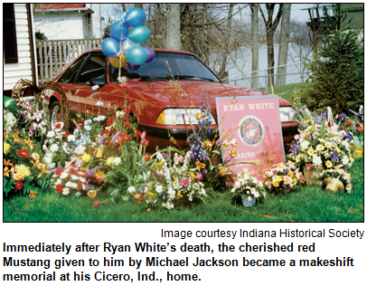 Immediately after Ryan White’s death, the cherished red Mustang given to him by Michael Jackson became a makeshift memorial at his Cicero, Ind., home. Image courtesy Indiana Historical Society.