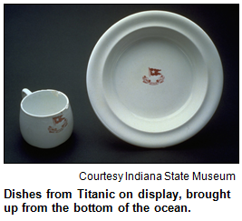 Dishes from the Titanic on display, brought up from the bottom of the ocean.  Courtesy Indiana State Museum.
