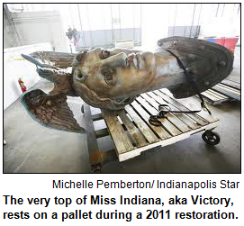The very top of Miss Indiana, aka Victory, rests on a pallet during a 2011 restoration. 