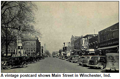 A vintage postcard shows Main Street in Winchester, Ind.
