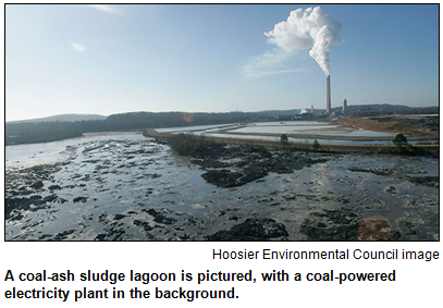 A coal-ash sludge lagoon is pictured, with a coal-powered electricity plant in the background. Image courtesy Hoosier Environmental Council.