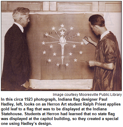 Paul Hadley, designer of Indiana's state flag, and Herron Art student Ralph Priest at flag. Image courtesy Mooresville Public Library.